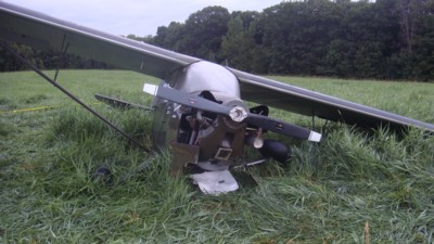 Plane with it’s left landing gear collapsed