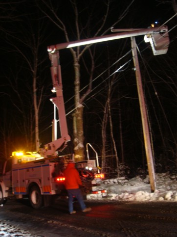 Power company utility truck disconnection the primary and secondary power