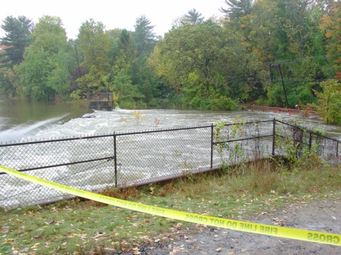 Water rushing over the dam at the north end of  Hamilton Reservoir.