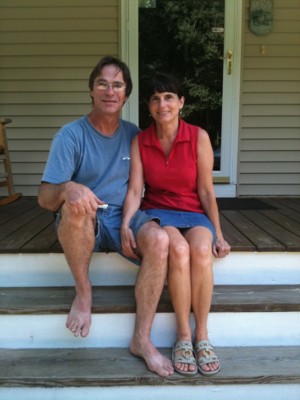 Bob-and-Andrea-Brunelle-sitting-on-the-steps-of-their-former-home-in-Wales