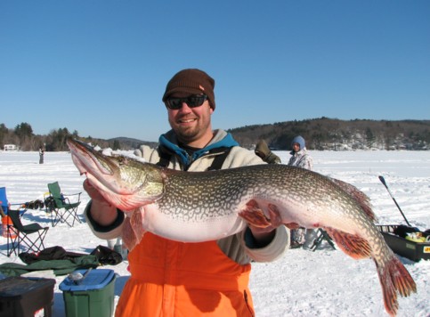 Michael Olbrich proudly showing his prize winner, a 43-3/4 inch, 23lb Northern Pike